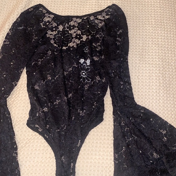 NEW body suit, never worn , tags attached . - Picture 2 of 4